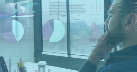 Businessman Analyzing Data with Digital Interface Effects