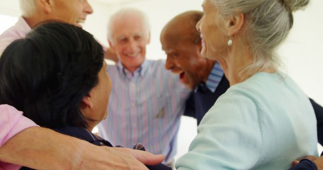 Senior Friends Embracing and Sharing Joy - Download Free Stock Images Pikwizard.com