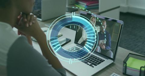 Professional collaborating with colleagues on video call