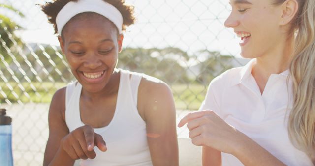 Diverse Friends Laughing Together at Outdoor Sports Court - Download Free Stock Images Pikwizard.com