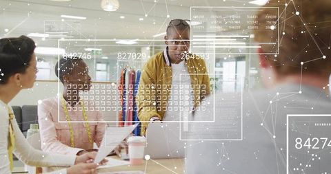 Creative team presenting fashion samples with ar data overlay during design review