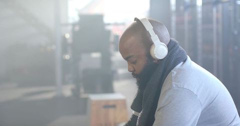 Monitoring Backstage Audio Wearing Headphones During Live Rehearsal Focused Technician