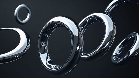 Floating Chrome Tori in Dark Abstract Futuristic Space