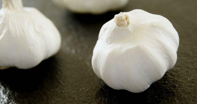 Whole Fresh Garlic Bulbs on Dark Background - Download Free Stock Images Pikwizard.com