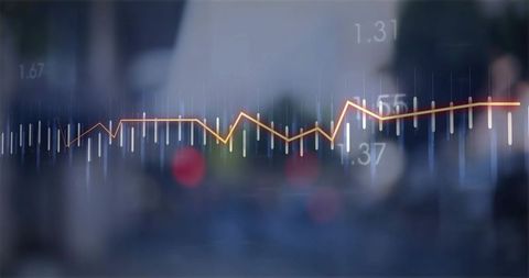 Glowing line graph and white bar charts over urban background