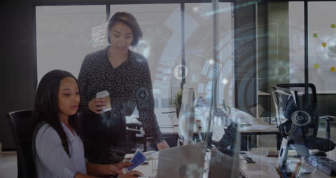 Collaboration in Futuristic Tech Office with Data Overlay