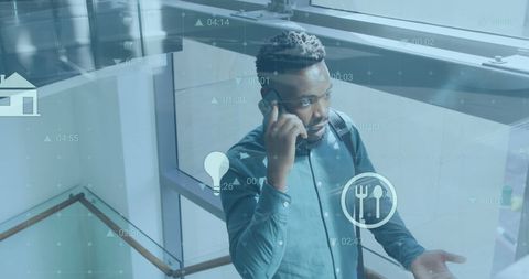 Businessman in Smart Building with Futuristic Interface Overlay