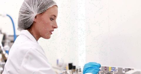 Technician adjusting lab equipment with precision in modern laboratory