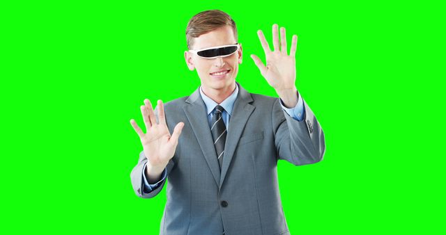 Businessman Interacting with Virtual Reality Technology on Green Screen - Download Free Stock Images Pikwizard.com