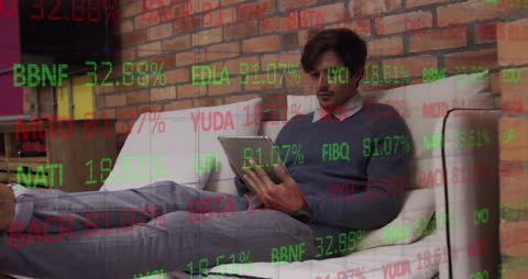 Man Analyzing Stock Market Data on Tablet in Comfortable Setting