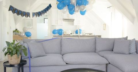 Home Birthday Celebration with Blue Balloons and Decor