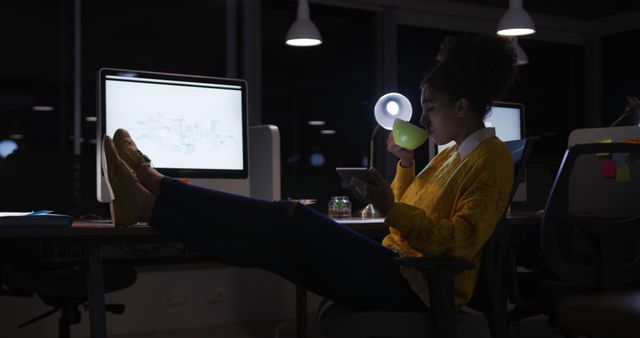 Young Woman Working Late at Night in Modern Office - Download Free Stock Images Pikwizard.com