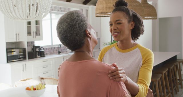 Senior Woman and Adult Daughter Enjoying Quality Time at Home - Download Free Stock Images Pikwizard.com