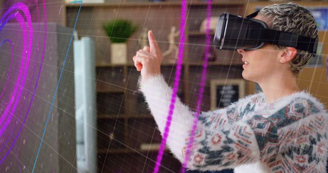 Neon light trails over scope scanner against caucasian woman wearing vr headset at home. computer interface and technology concept