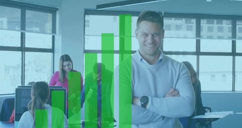 Smiling Businessman Analyzing Growth with Team in Office Environment