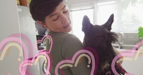 Woman Hugging Pet Dog in Heart Overlay, Celebrating Valentine's
