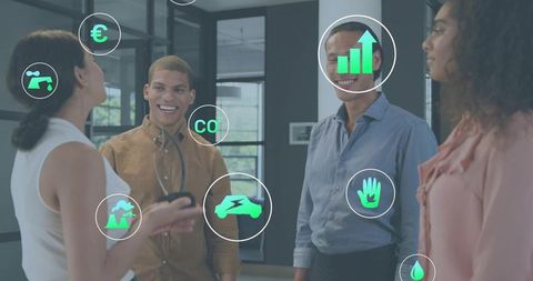 Diverse team discussing sustainable business strategy with eco tech icons overlay