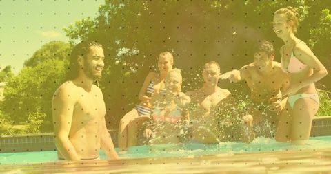 Sunlit backyard pool party with laughing friends splashing water in swimwear