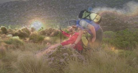 Hiking couple exploring scenic mountain landscape