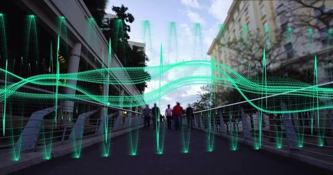 Urban pedestrians walking across bridge with neon waveform overlay suggesting data flow