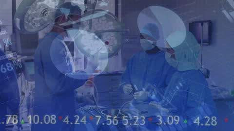Medical Professionals Analyzing Data During Surgery