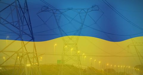 Ukrainian flag overlaid on electricity infrastructure