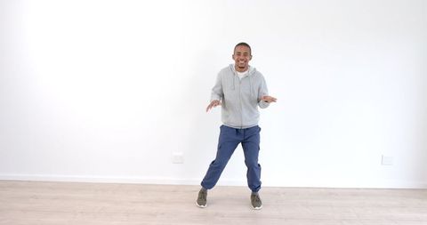 African American Man Dancing Joyfully in Casual Attire - Download Free Stock Images Pikwizard.com