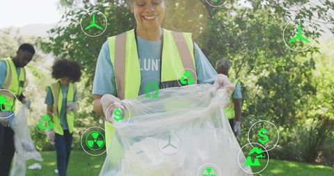Volunteer holding clear trash bag collecting park litter during community cleanup eco icons