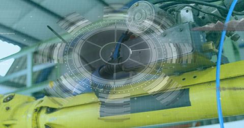 Mechanics precision working on large industrial machine in robotics facility