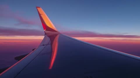 Passenger Films Vast Sunset from Airplane in Flight