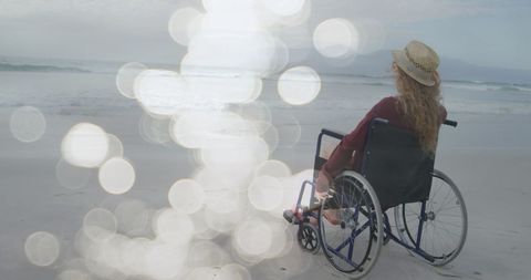 Contemplative Woman in Wheelchair Enjoying Beach View