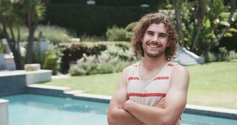 Relaxed Young Man Enjoying Sunny Day by Pool in Home Garden - Download Free Stock Images Pikwizard.com