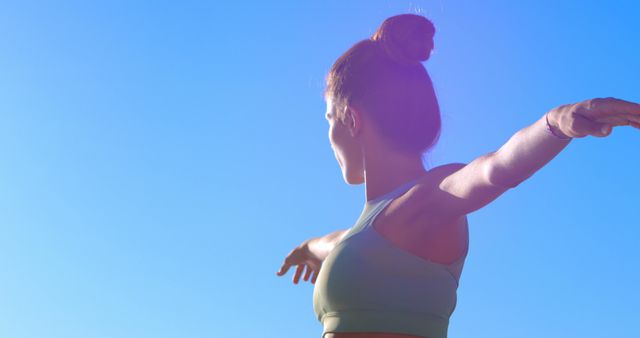 Woman Practicing Outdoor Yoga Against Clear Blue Sky - Download Free Stock Images Pikwizard.com
