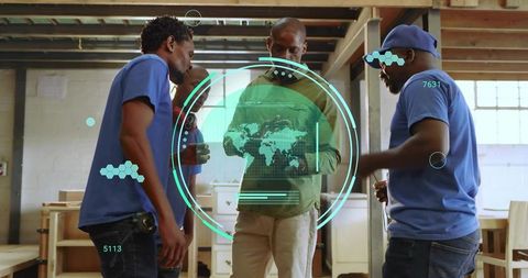 Woodworkers Collaborating with Holographic Map and Digital Interface in Workshop