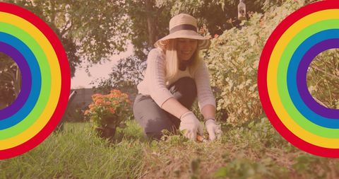 Smiling Woman Gardening with Pride Rainbows