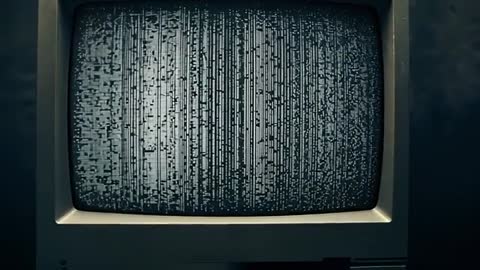 Vintage CRT Monitor Displaying Digital Static in Studio