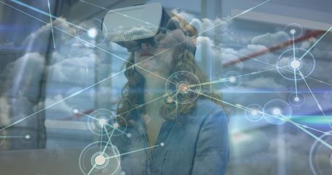 Woman immersed in virtual reality with digital cloud network