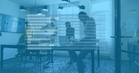 Business Team Collaboration in Modern Office with Overlaid Graphs