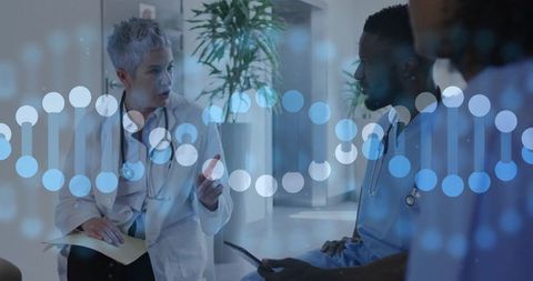 Medical team discussing genetic data with digital DNA overlay during clinical consultation