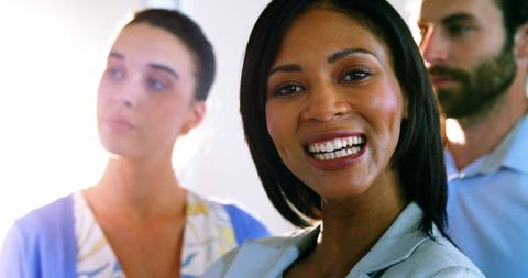 Confident Female Executive Smiling in Office Setting