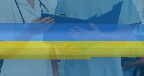 Healthcare Team Discussing Medical Reports with the European Union Flag Overlay - Download Free Stock Images Pikwizard.com