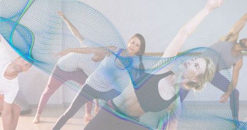 Group stretching class performing side-bend flow in minimalist studio with mesh overlay