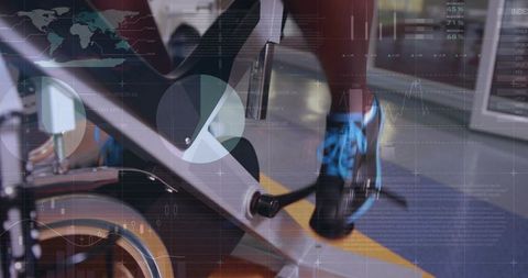 Gym-goer Pedaling Spin Bike with Dynamic Data Overlay