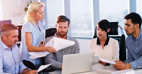 Diverse Business Team in Focused Strategy Meeting - Download Free Stock Images Pikwizard.com