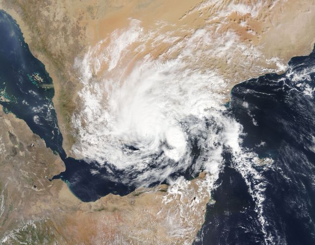 This aerial view of Tropical Cyclone Chapala approaching Yemen is taken by the MODIS instrument aboard NASA's Aqua satellite. Useful for meteorology, science articles, disaster management reports, educational materials, and presentations on natural disasters.