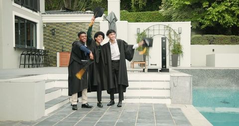 Joyful graduation celebration by poolside