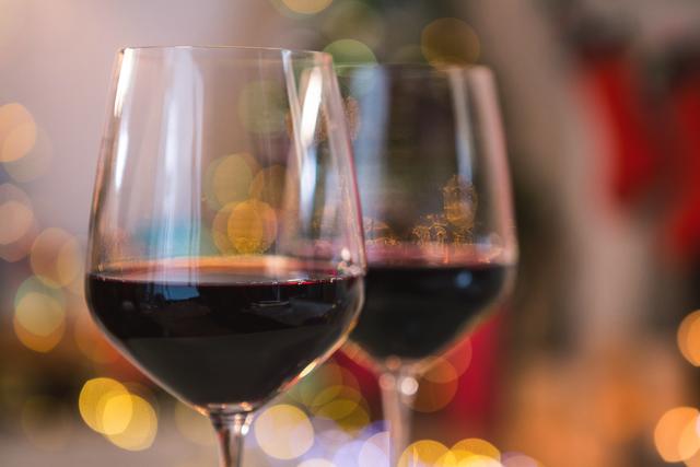 Two glasses of red wine during christmas celebration