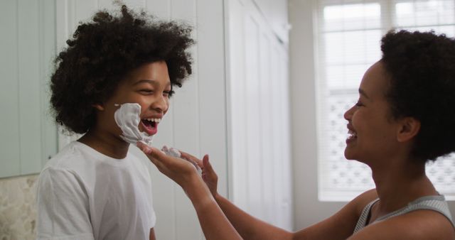 Mother and Son Laughing During Shaving Foam Play in Bathroom - Download Free Stock Images Pikwizard.com