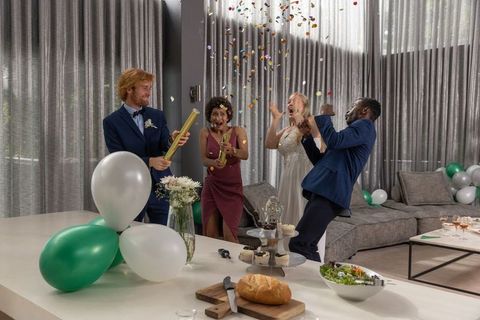 Wedding Celebration with Joyful Friends and Glamorous Confetti Popper