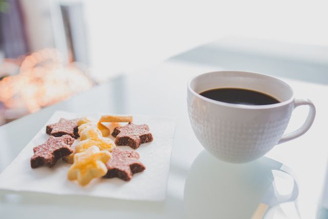 Morning Coffee with Star-shaped Cookies on White Table - Download Free Stock Photos Pikwizard.com